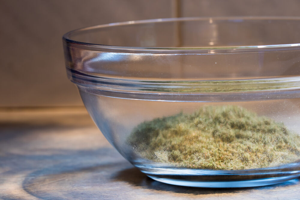 decarbed cannabis in glass bowl for making marijuana tincture