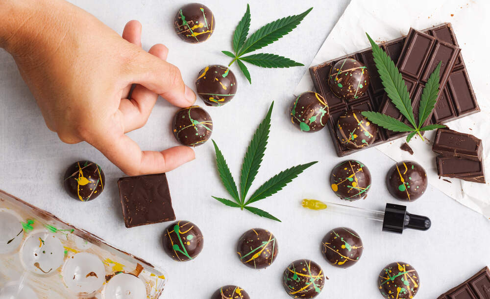 chocolate edibles with marijuana leaves and cannabis oil