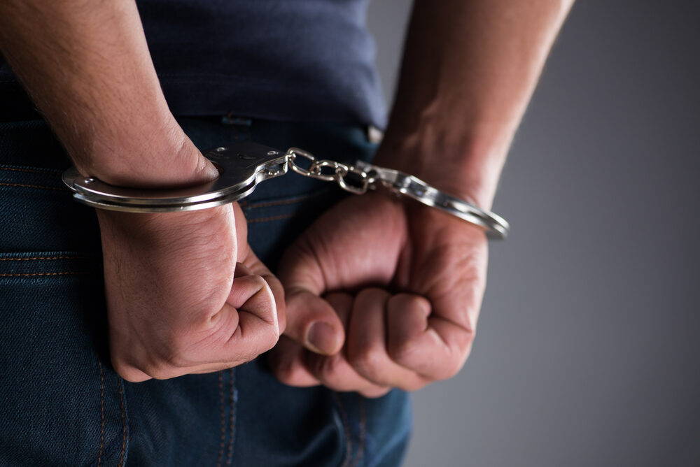 hands in handcuffs